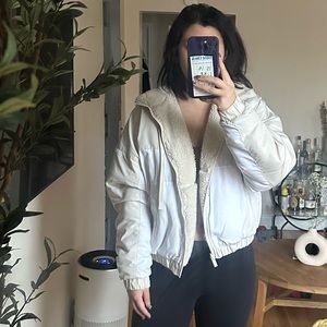 Alo’s reversible bomber jacket with sherpa lining and hood.